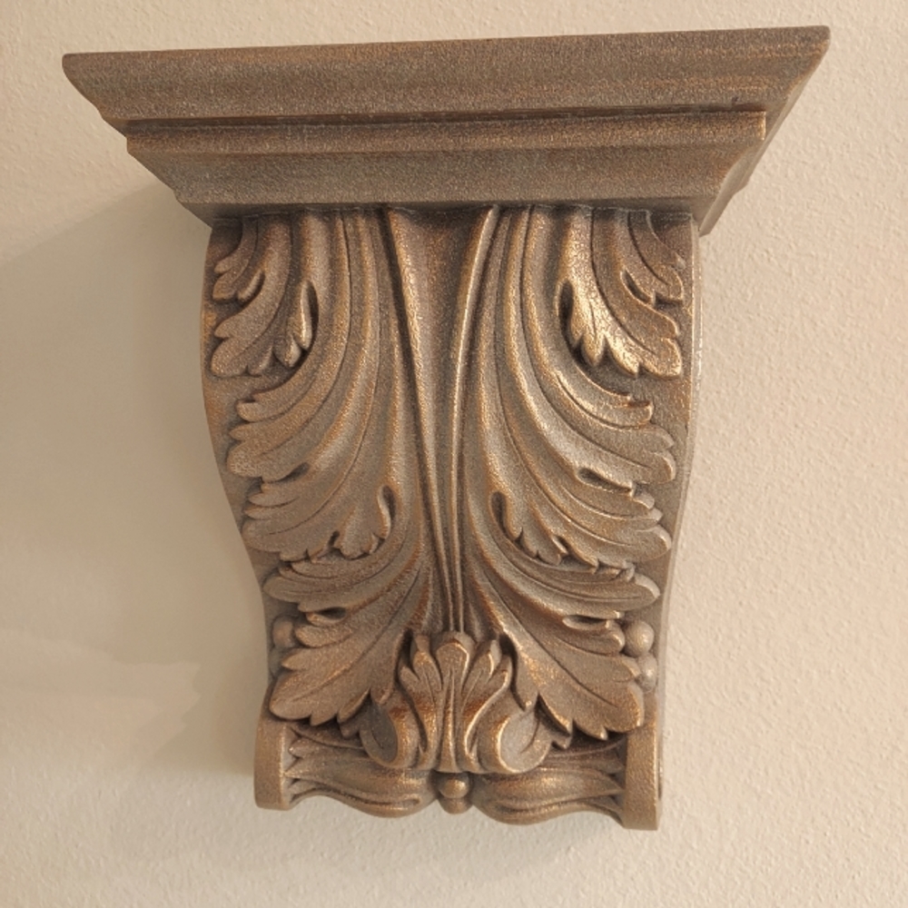Architectural Two-Tone Gold/Taupe Wall Self. Made from plastic.
